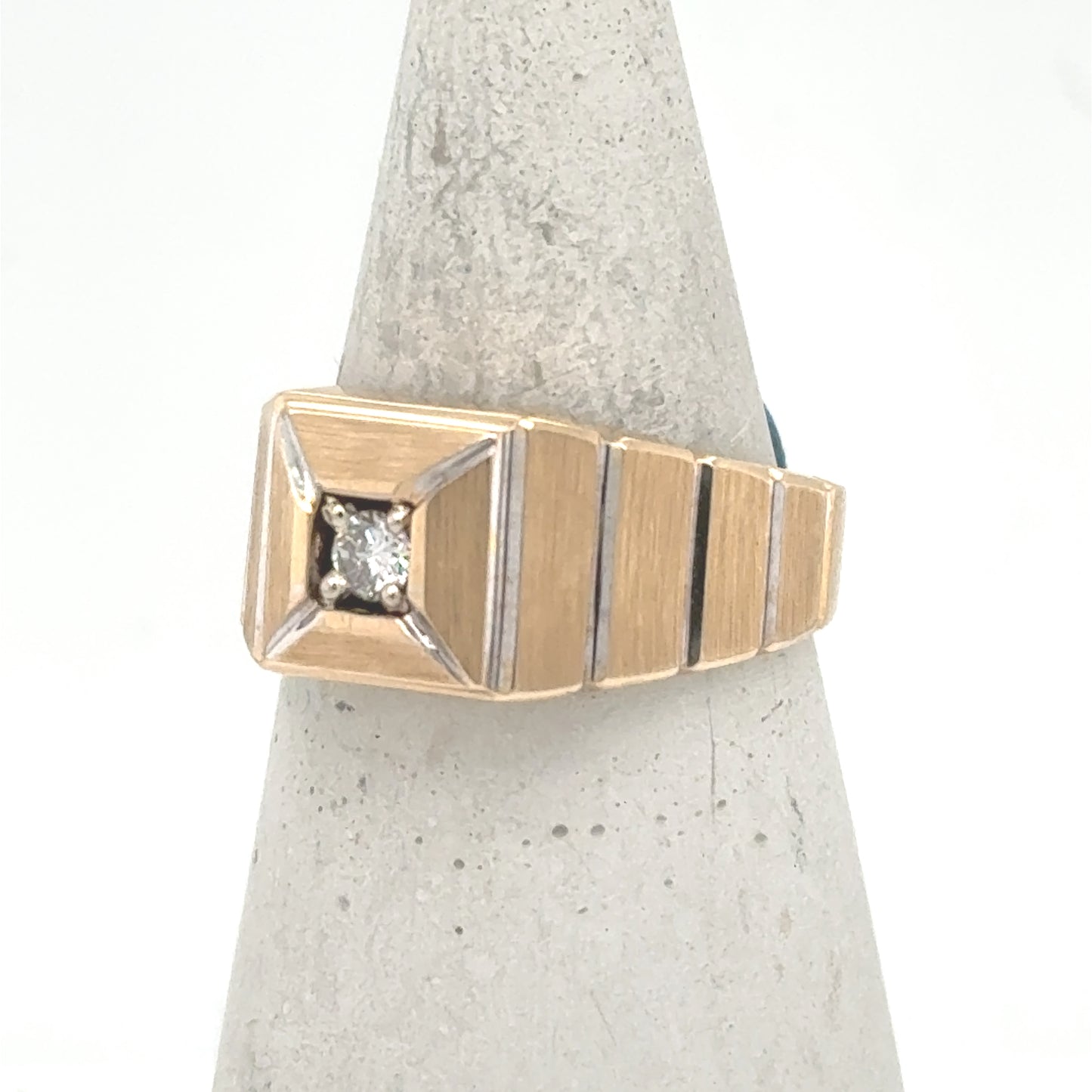 14K two-tone men’s ring with square top and prong-set round diamond.