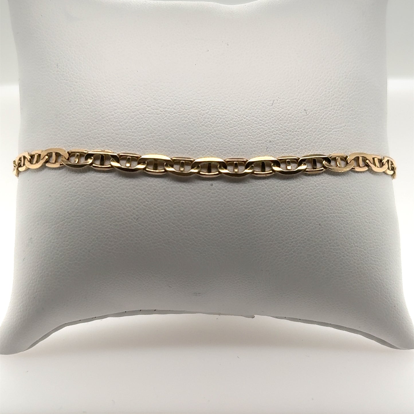 14K yellow gold anchor link bracelet with polished links and lobster clasp.