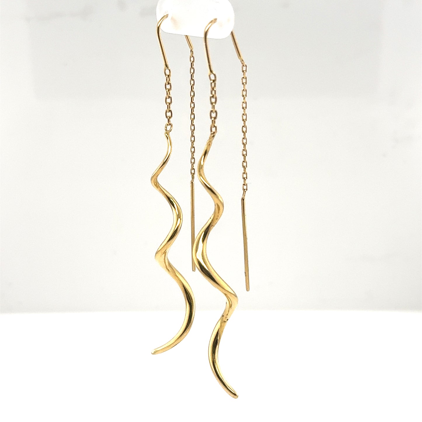 14K yellow gold threader earrings with twisted drop tubing and delicate chains.