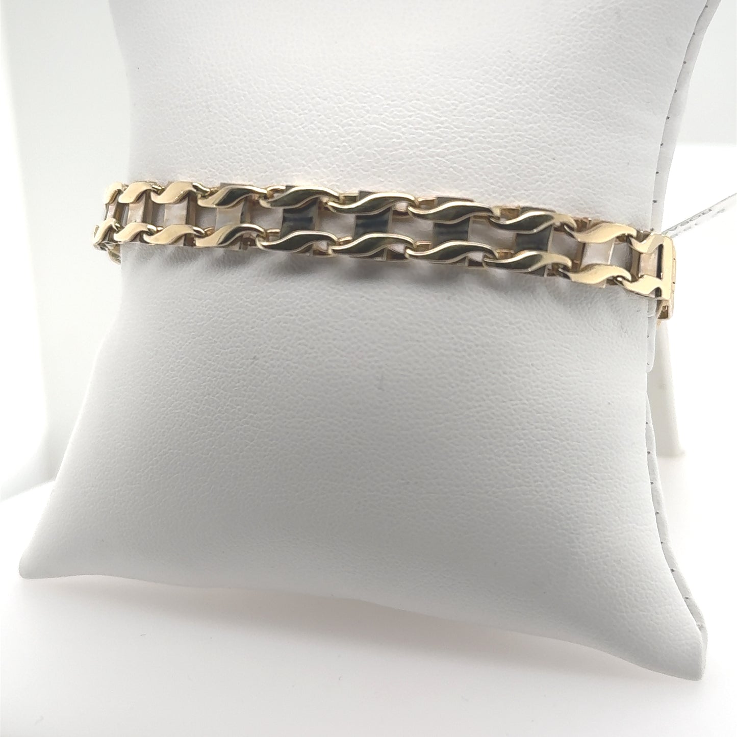 14K yellow and white gold railroad link bracelet with lobster clasp.