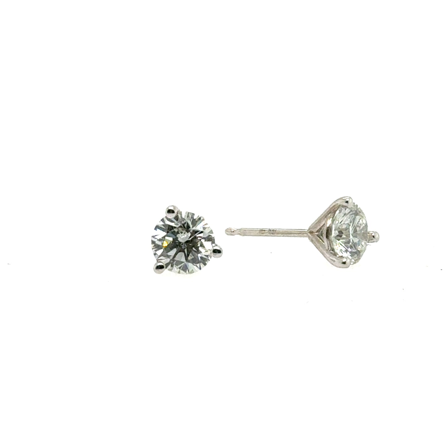 White gold stud earrings with round lab-grown diamonds in three-prong martini settings.