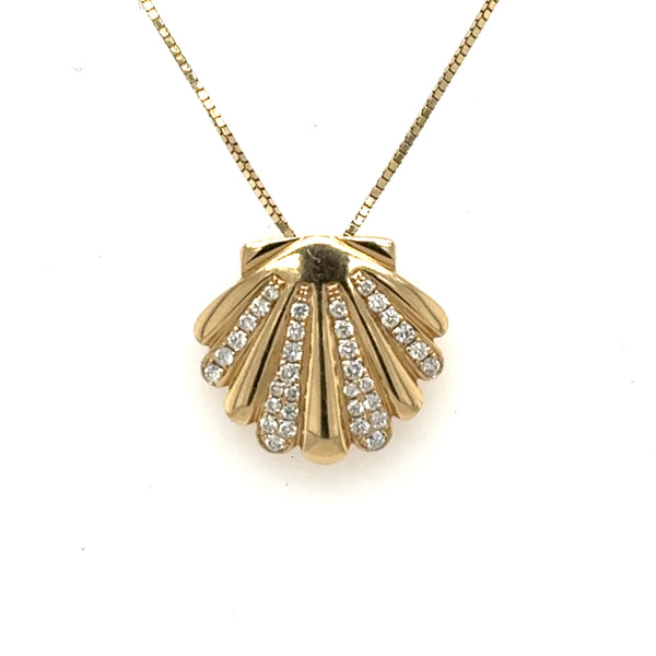 Yellow gold seashell pendant with pavé diamond ribs on a box chain.