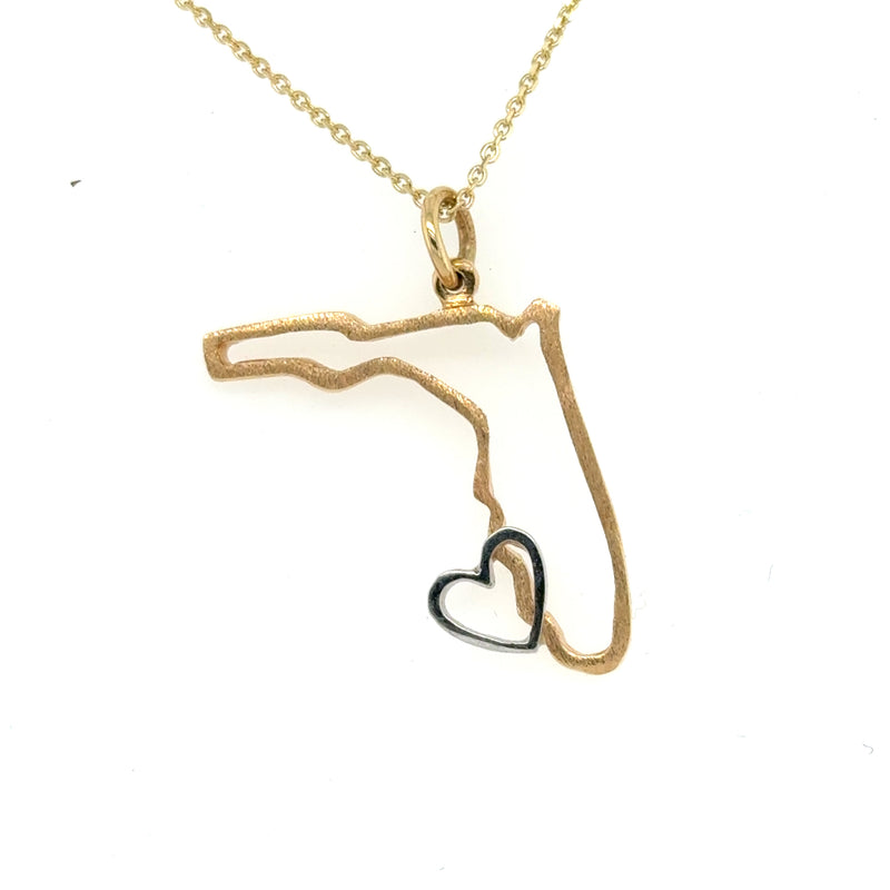 14K yellow gold Florida outline pendant with small white gold heart charm.