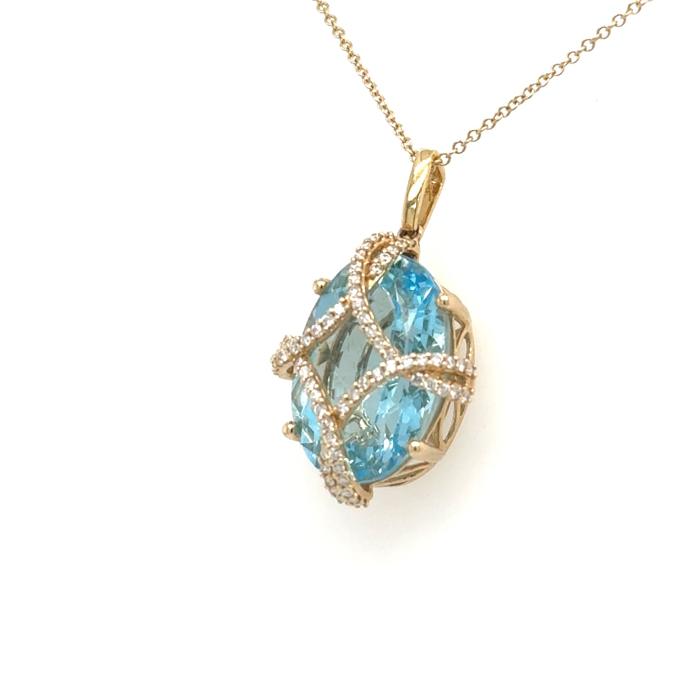 14K yellow gold pendant with oval Swiss blue topaz and diamond lattice cage.