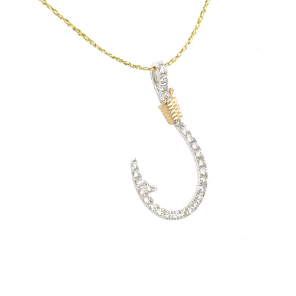14K white gold diamond hook pendant with yellow gold wrapped accent near bail.