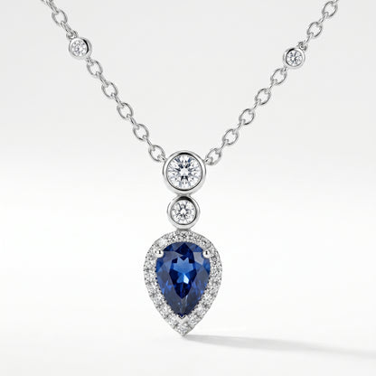 18K White Gold Pear Sapphire & Diamond Halo Pendant Necklace
