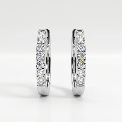 14K White Gold Diamond Huggie Earrings - 0.08ctw Round Cut