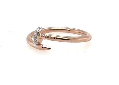 Rose gold nail-shaped ring with four small round diamonds on the head.