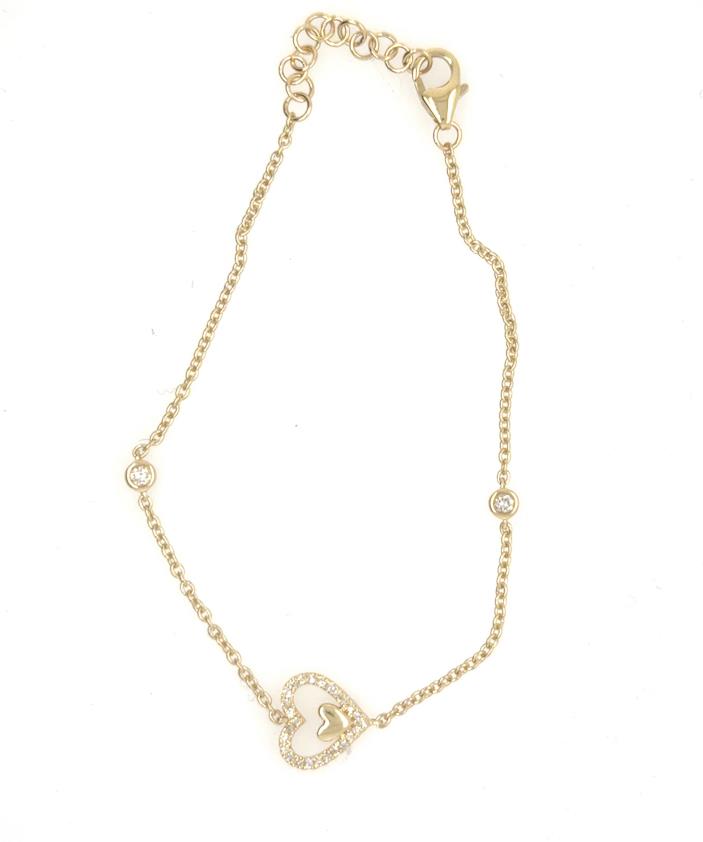 Yellow gold bracelet with diamond pavé heart charm, bezel diamond accents, lobster clasp.