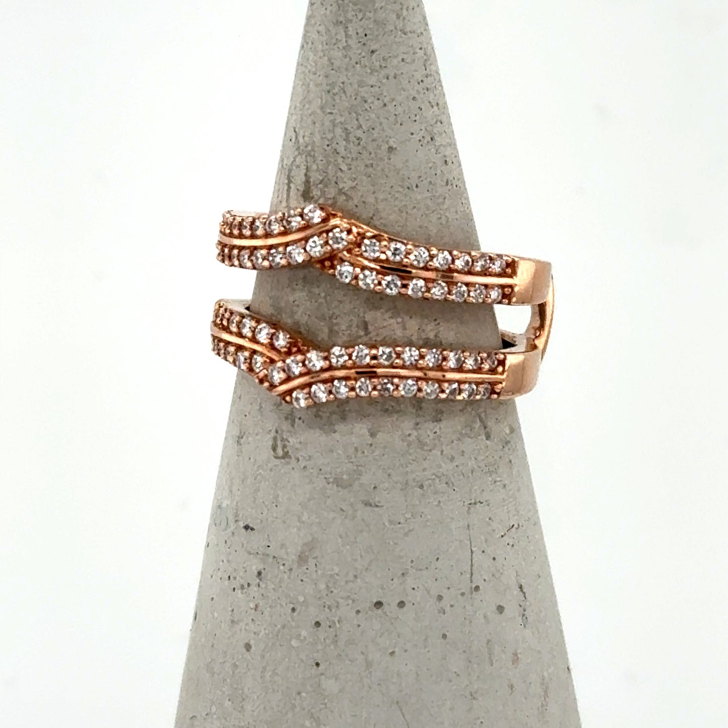 14K rose gold diamond enhancer band with two wavy, prong-set pavé rows.