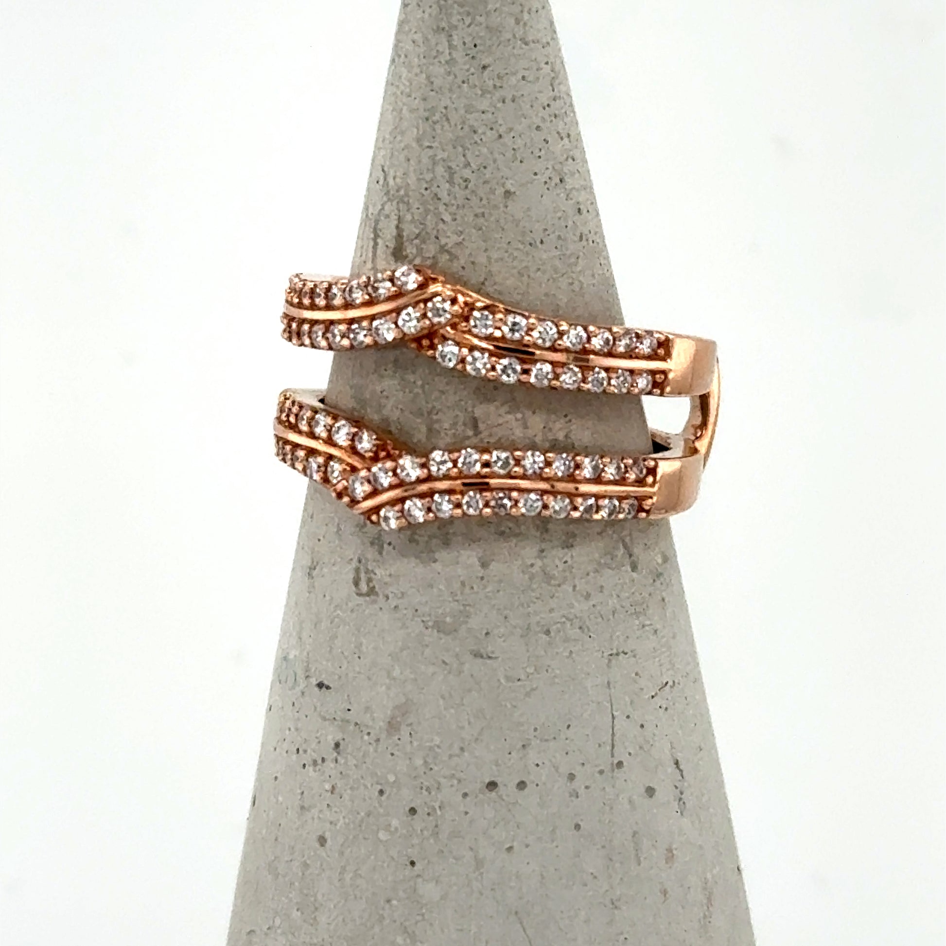 14K rose gold diamond enhancer band with two wavy, prong-set pavé rows.