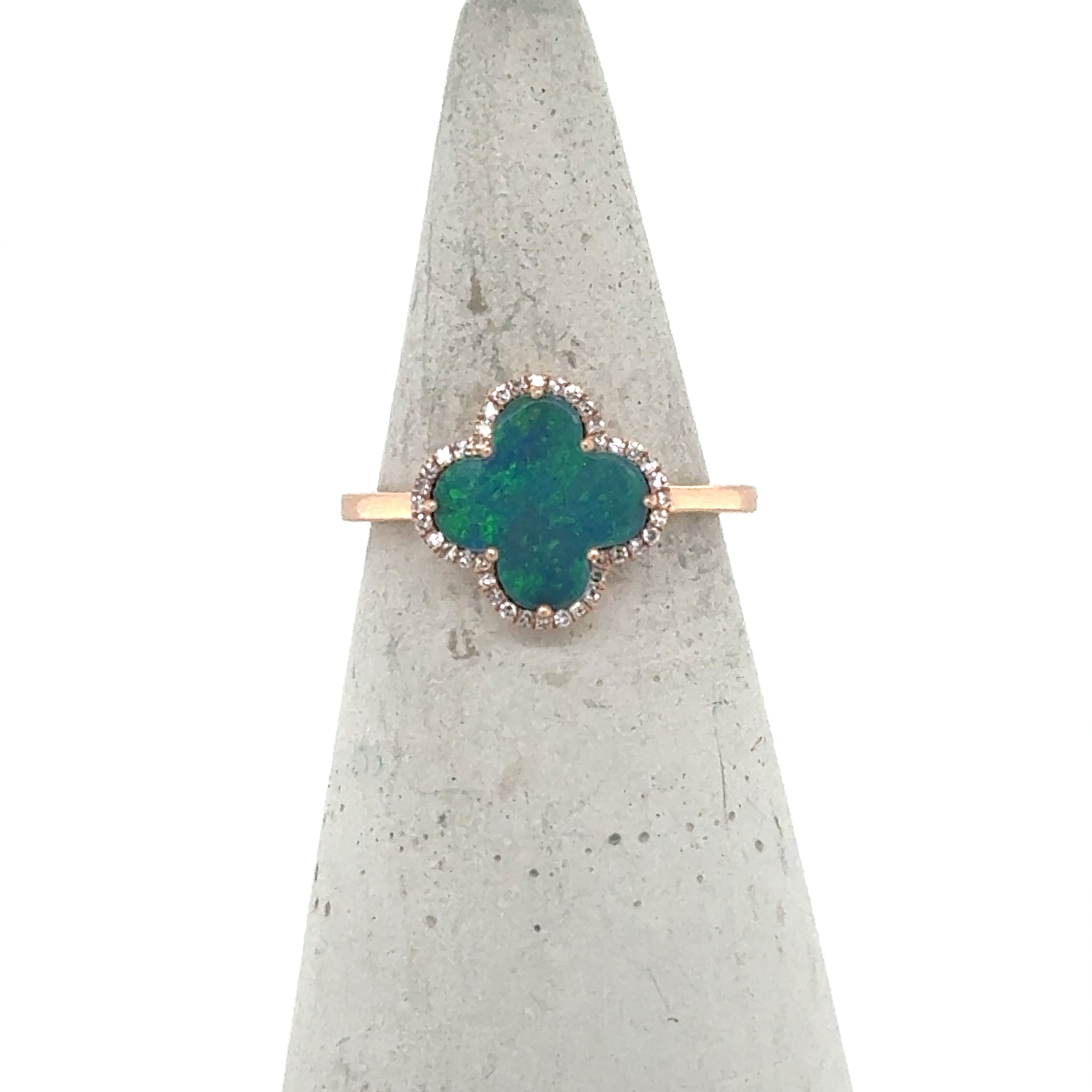 14K rose gold ring with clover-shaped green-blue opal doublet and diamond halo.