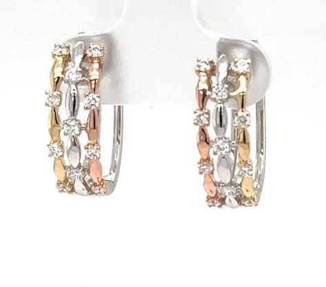 14K tri-color gold oval hoop earrings with round prong-set diamonds throughout.