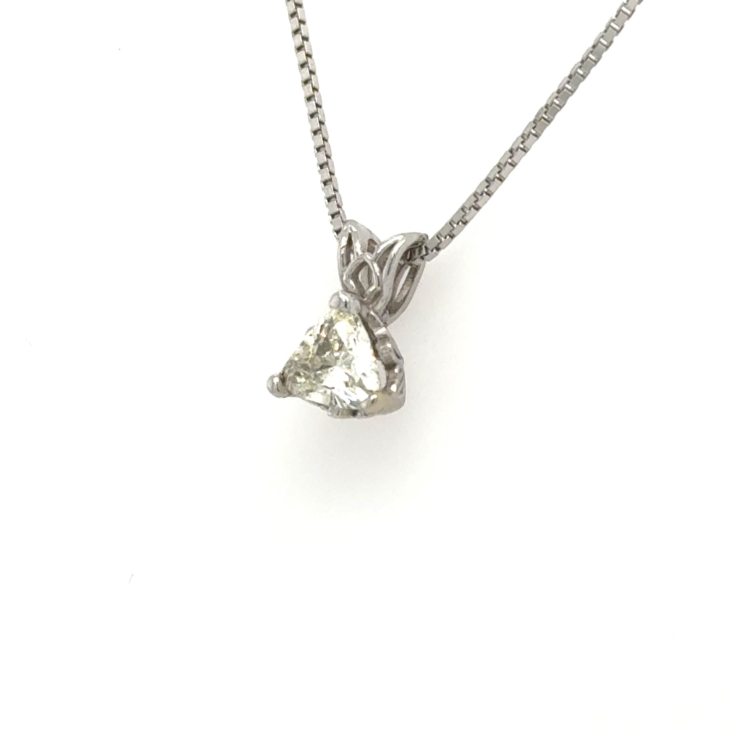 Trillion-cut diamond solitaire in 14K white gold, three-prong basket with rabbit-ear bail.