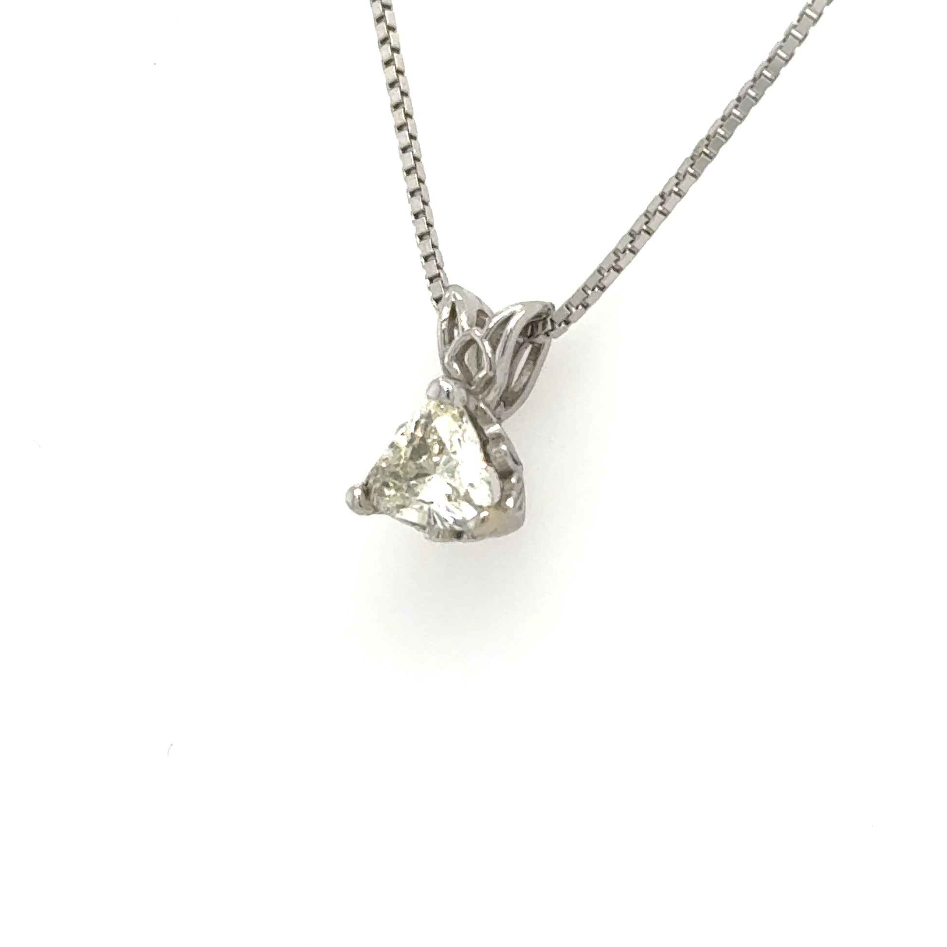 Trillion-cut diamond solitaire in 14K white gold, three-prong basket with rabbit-ear bail.