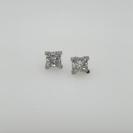 Princess-cut diamond stud earrings in white gold four-prong settings, shown front-facing.