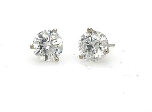 Round lab-grown diamond stud earrings in 14K white gold three-prong martini settings.