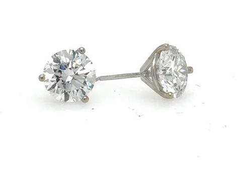 Round lab-grown diamond stud earrings in 14K white gold three-prong martini settings.