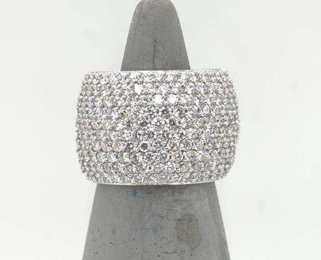 Wide 14K white gold pavé band with multiple rows of round diamonds.