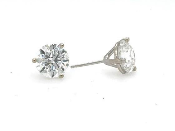 Round lab-grown diamond studs in 14K white gold three-prong martini settings.