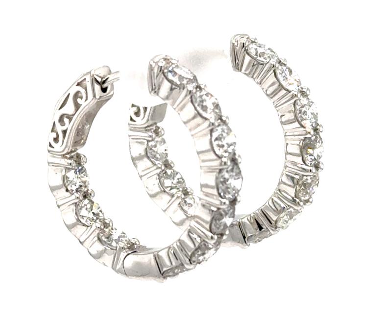 14K white gold inside-out hoop earrings with round diamonds and locking backs.