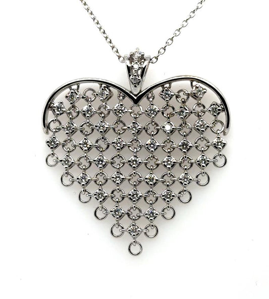 14K white gold chainmail heart pendant with round diamond lattice on rolo chain.