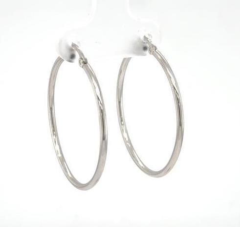 Thin 14K white gold tube hoop earrings with hinged post backs.
