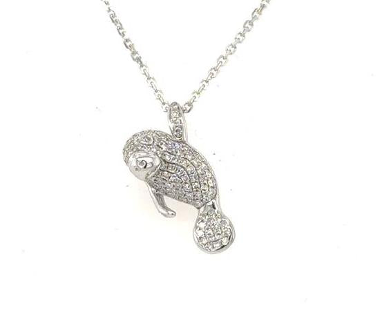 14K white gold diamond pavé waving manatee pendant on an 18-inch cable chain.