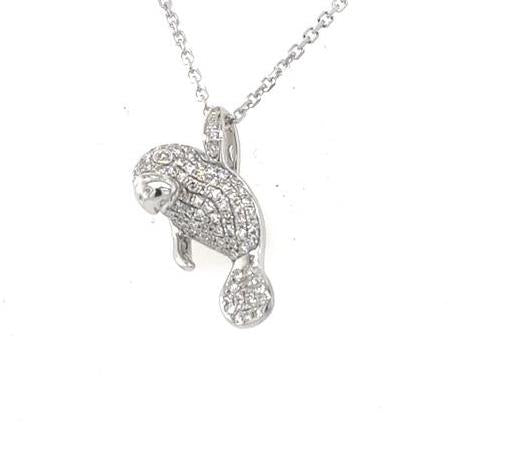 14K white gold diamond pavé manatee pendant with hidden bail on cable chain.