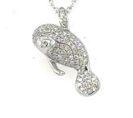 14K white gold diamond pavé waving manatee pendant on an 18-inch chain.