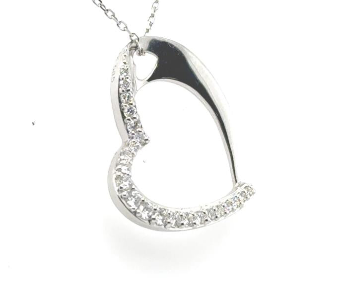 14K white gold open heart pendant with shared-prong diamonds on cable chain.
