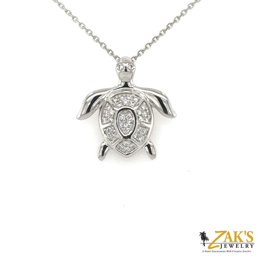 14K white gold turtle pendant with pave-set round diamonds on the shell.