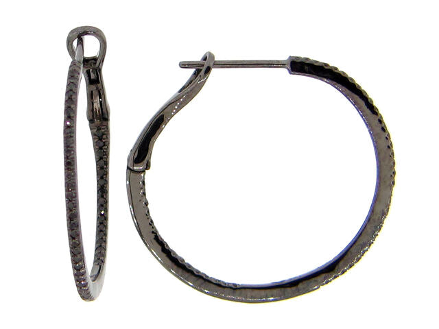 Inside-out hoop earrings in dark rhodium white gold with round black diamonds.