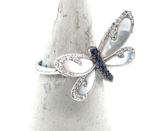 14K white gold ring with mother‑of‑pearl, diamond, and sapphire dragonfly motif.