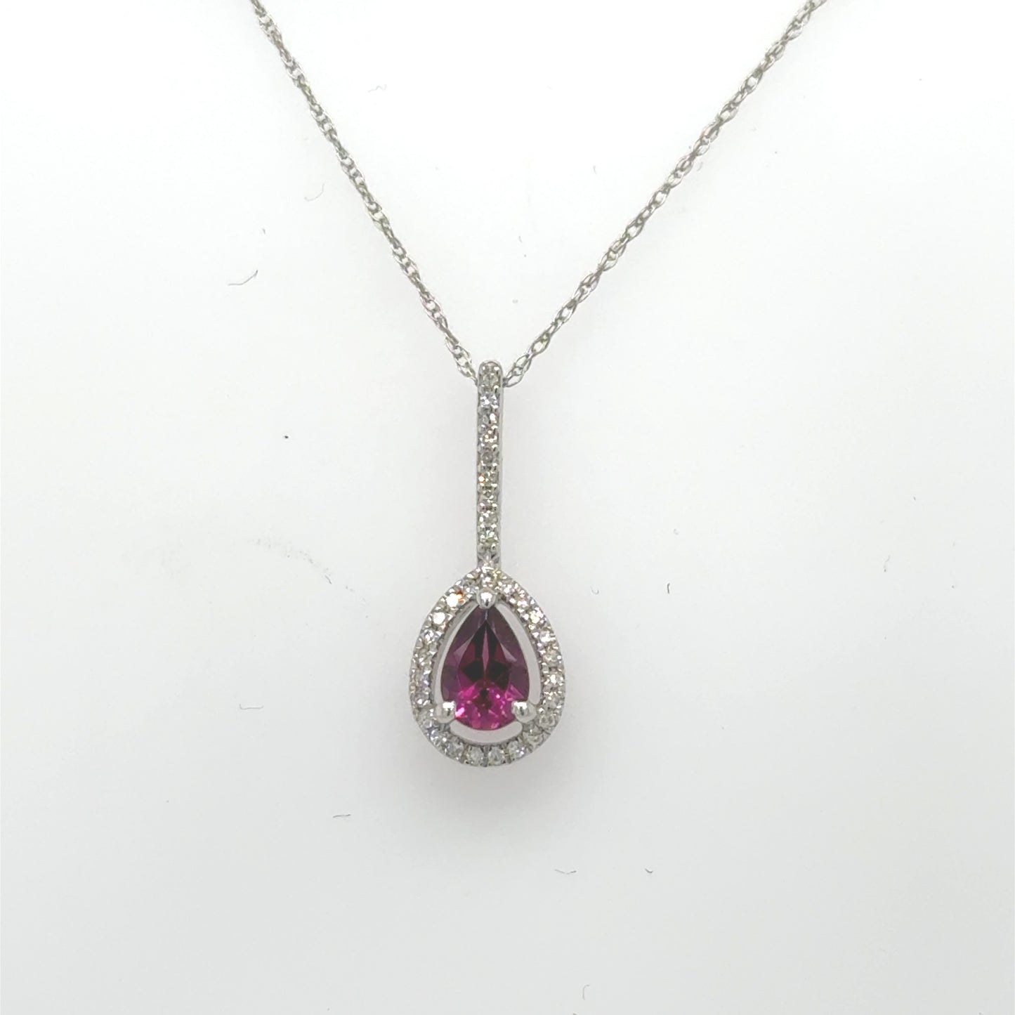 14K white gold necklace with pear-shaped rhodolite garnet and diamond halo.