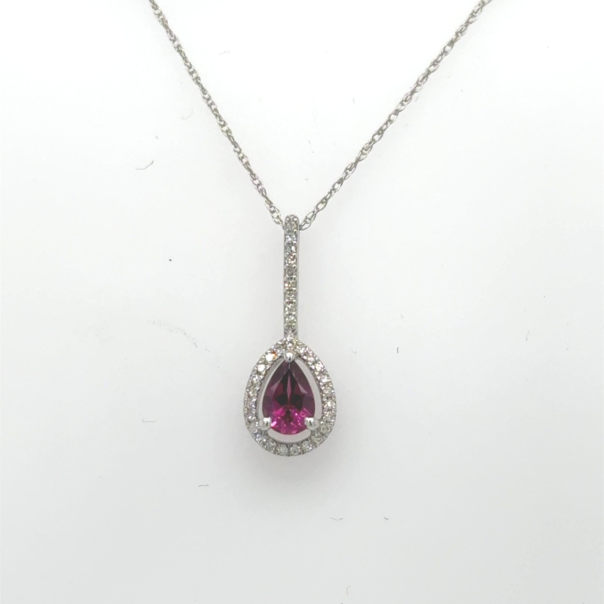 14K white gold necklace with pear-shaped rhodolite garnet and diamond halo.