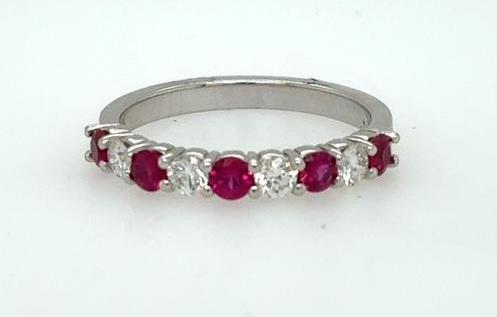 14K white gold band with alternating round rubies and diamonds in shared prong setting.