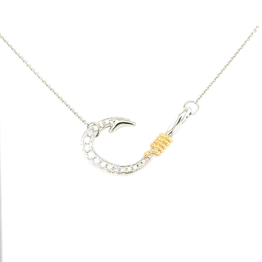 14K white and yellow gold diamond fish hook pendant on fine rolo chain.