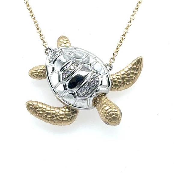 14K yellow and white gold sea turtle pendant with diamond-accent shell on rolo chain.