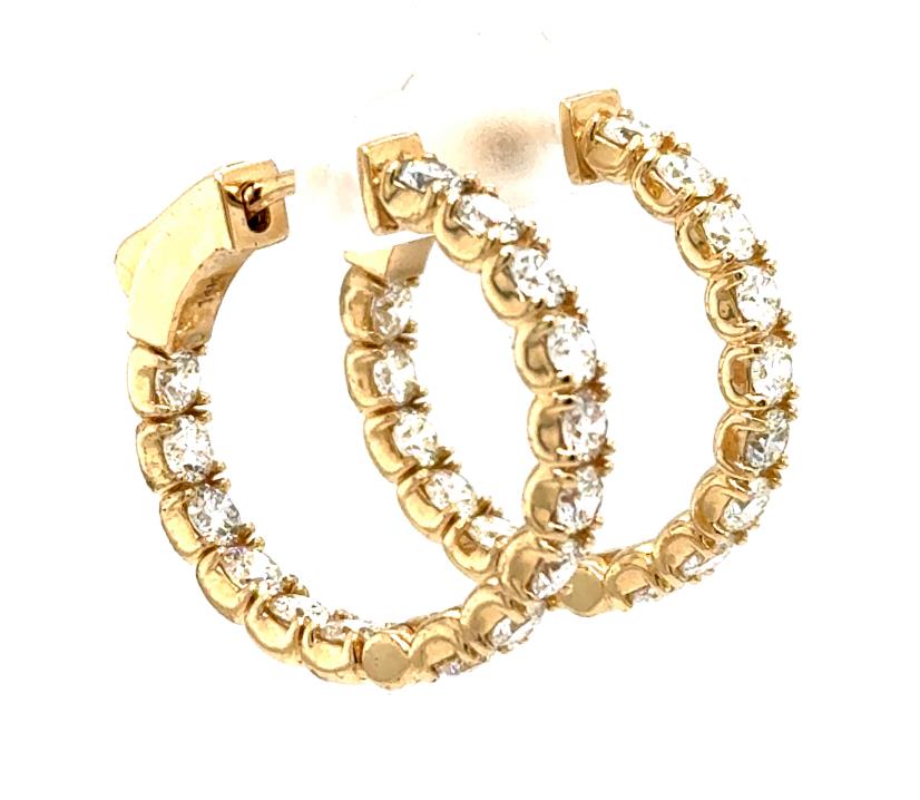 Yellow gold inside-out hoop earrings with round diamonds and locking hinged backs.