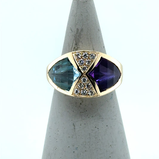 14K yellow gold ring with bezel-set blue topaz, amethyst, and pavé diamonds.
