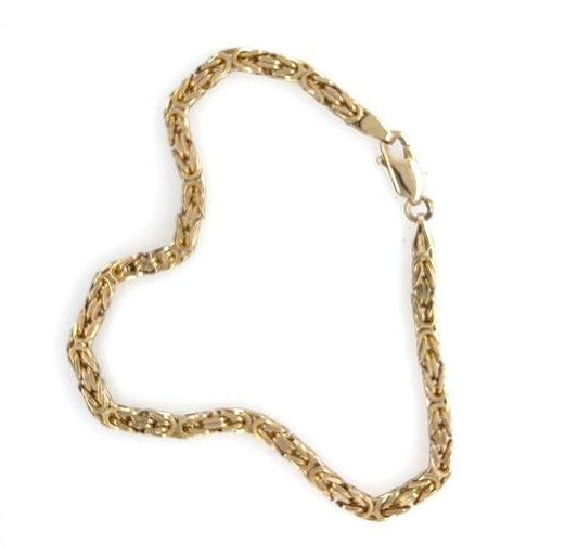 14K yellow gold Byzantine link bracelet with 3.3mm square chain and lobster clasp.