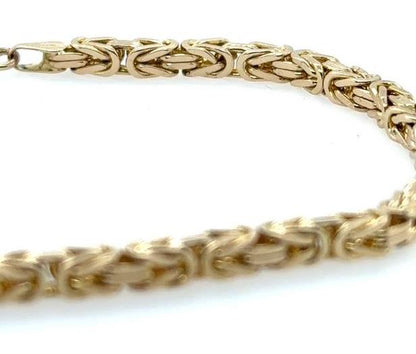 14K yellow gold Byzantine link bracelet with square profile and lobster clasp.