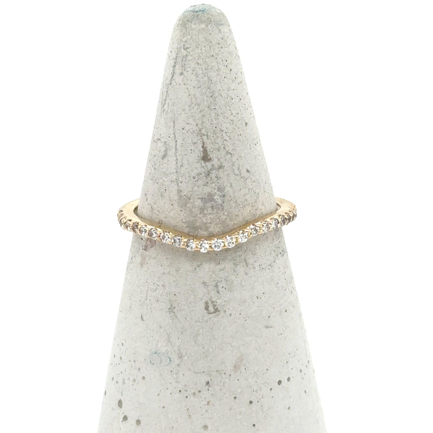 Curved 14K yellow gold band with a pavé row of round diamonds.