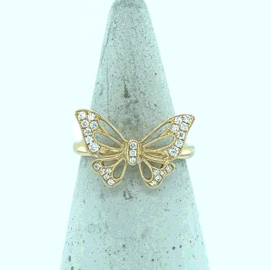 14K yellow gold ring with openwork butterfly motif accented by round diamonds.