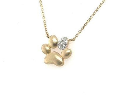 14K yellow gold paw print pendant with diamond accent on cable chain.