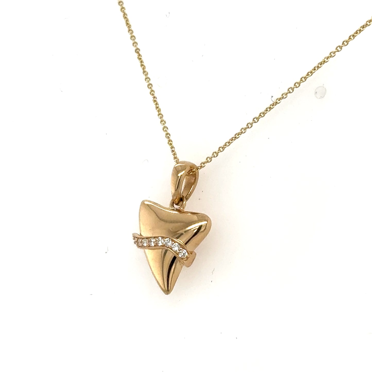 14K yellow gold shark tooth pendant with diamond-accented wave on cable chain.