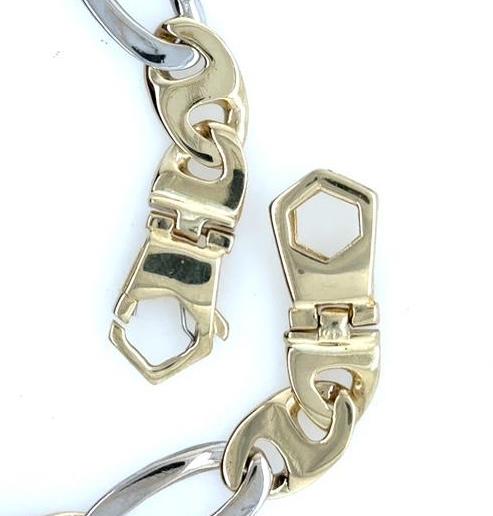 Two-tone 14K Fancy Figaro bracelet with yellow links, white links, and heavy lobster clasp.