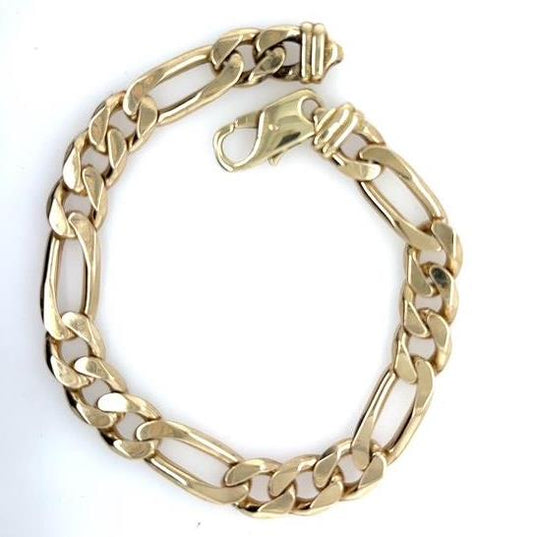 14K yellow gold Figaro link bracelet with polished finish and lobster clasp.