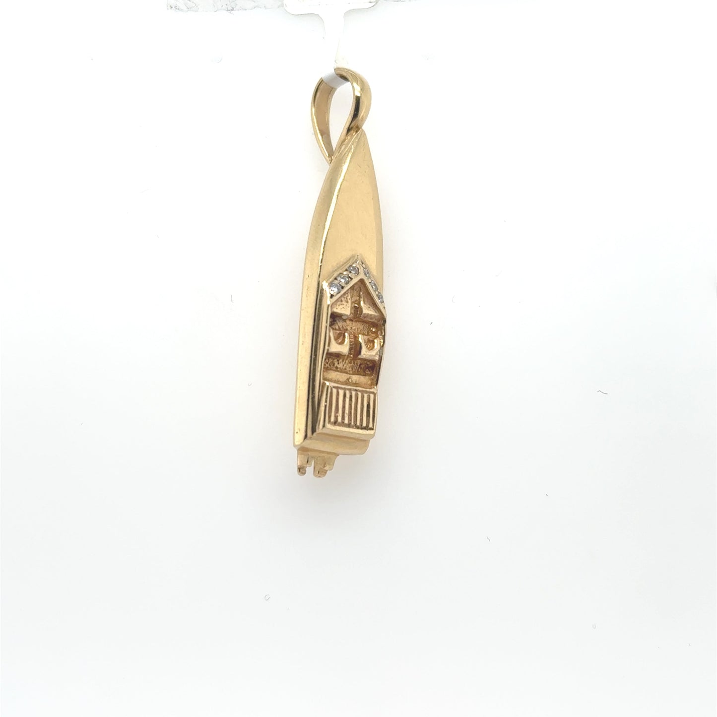 14K yellow gold speedboat pendant with diamond accents and a fixed bail.